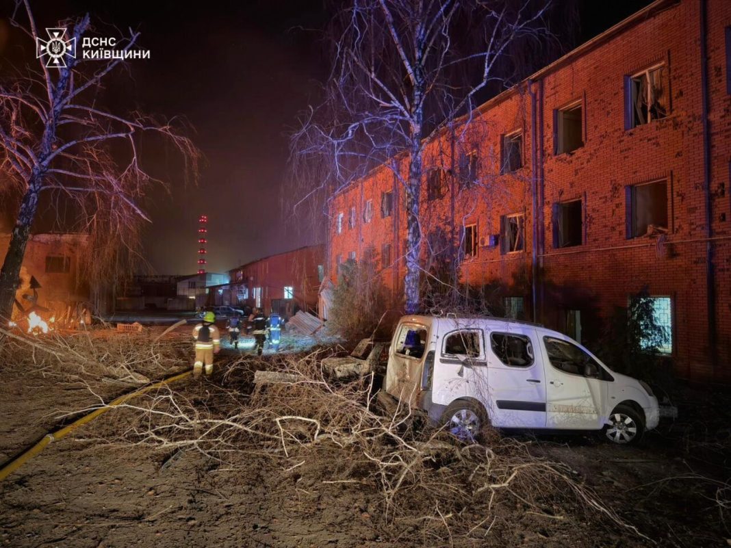 Damaged houses and broken windows after shelling in Kyiv region