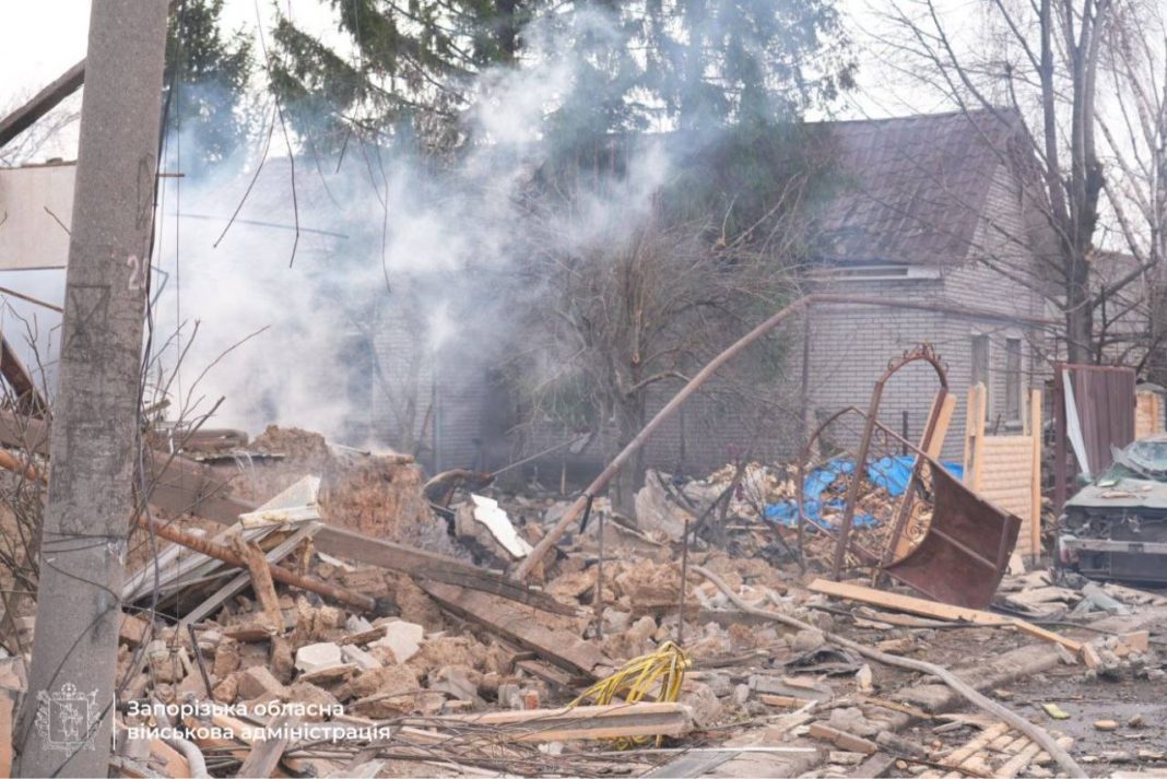 Rescuers work at the site of a destroyed house in Zaporizhzhia