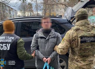 SBU eliminates Russian GRU killer and detains accomplices Armed SBU officers during a special operation