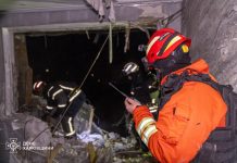 UAV hits a high-rise building in Kharkiv Rescuers work near damaged high-rise building in Kharkiv after drone strike