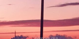 Night panorama of an industrial plant with smoke after an explosion