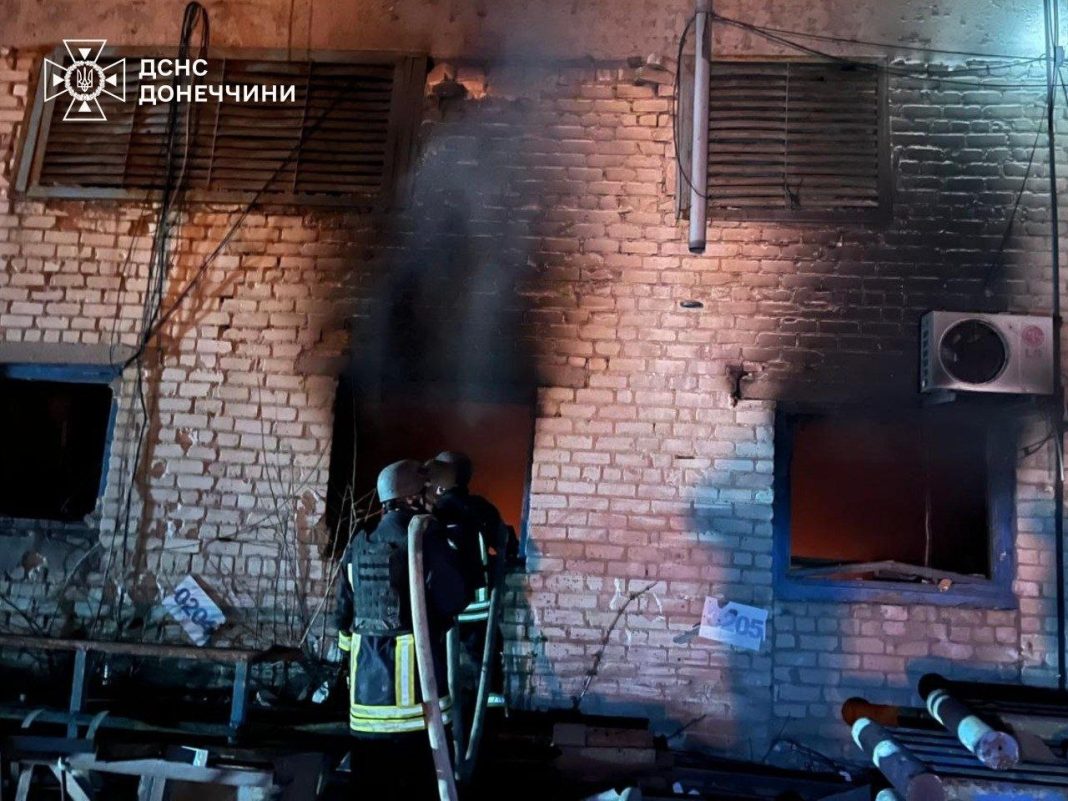 Firefighters extinguish the fire on the territory of the enterprise after the shelling