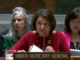 Candles and toys at the memorial to those killed in the war in Ukraine