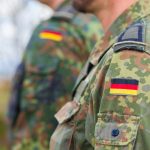 Germany cancels ban on conscripts' travel