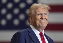 Donald Trump speaking at a political forum