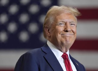 Donald Trump speaking at a political forum