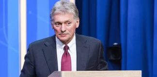 Peskov at a briefing in the Kremlin