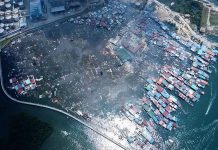 Fire destroys houses on the water