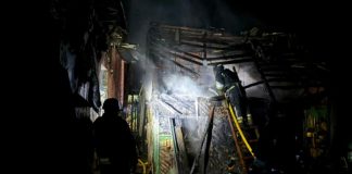 Rescuers extinguish fire after shelling