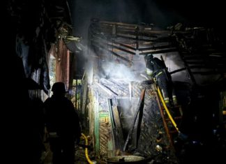 Rescuers extinguish fire after shelling
