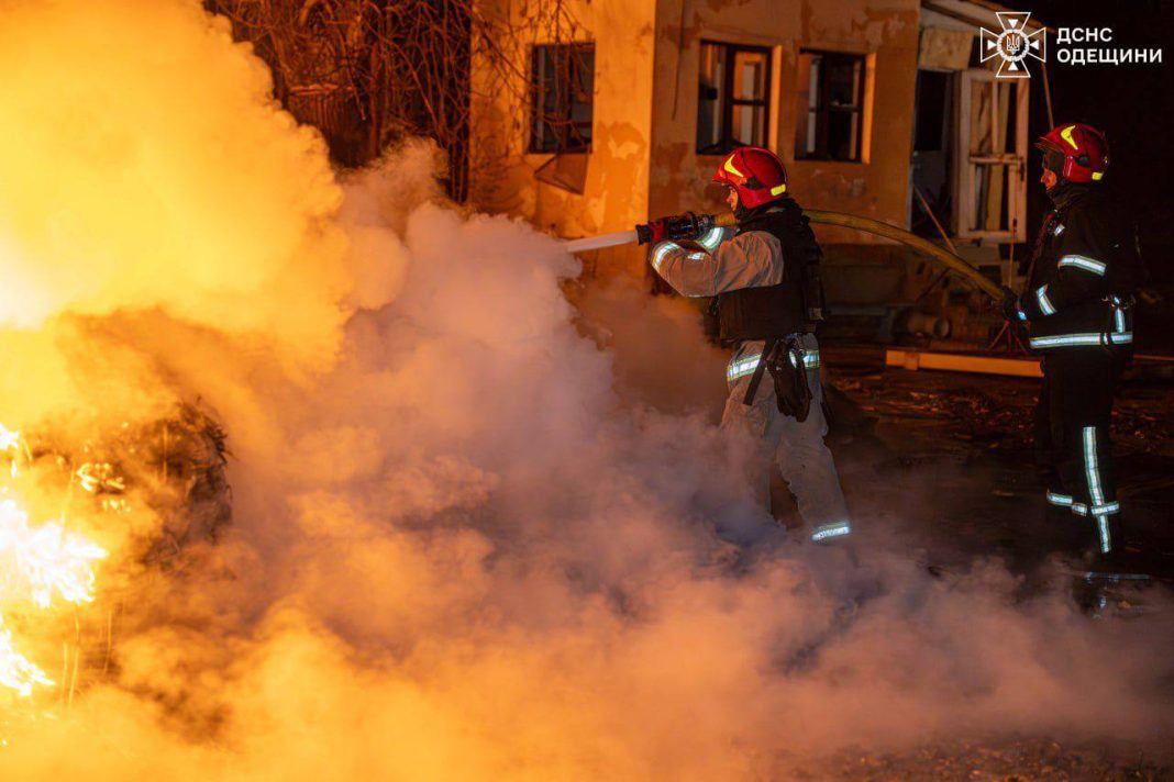 Rescuers extinguish fire after attack