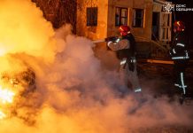 Rescuers extinguish fire after attack