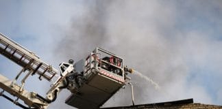 Rescuers extinguish a fire after shelling in Zhytomyr region.