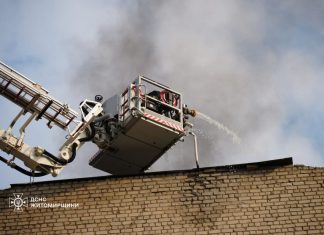 Rescuers extinguish a fire after shelling in Zhytomyr region.