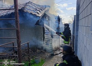 Rescuers extinguish fire after drone attack