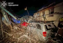 Rescuers near a destroyed building in Odesa