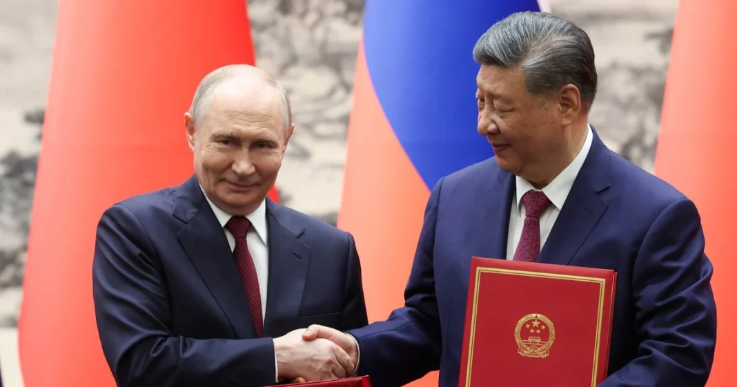 043325a5681005c1f4b77b2eaced1ec0 Putin and Xi Jinping after their meeting in Beijing