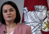 Білоруська опозиціонерка Світлана Тихановська прибуде до України Світлана Тихановська на тлі прапора Білорусі