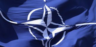 NATO strengthens Baltic defence with new military corps NATO flag