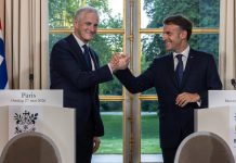 Прем'єр-міністр Норвегії Йонас Гар Стере та президент Франції Еммануель Макрон під час зустрічі в Парижі