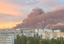 Drones strike at key Russian oil infrastructure Fire at an oil refinery in Saratov after a drone attack with thick black smoke in the background.