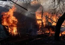 Rescuers extinguish fires after shelling in Sumy