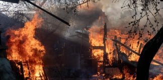 Rescuers extinguish fires after shelling in Sumy