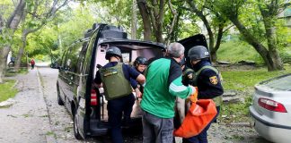 Rescuers evacuate injured man after hostile shelling in Dnipro region