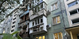 Vehicles and a multi-storey building damaged in Zaporizhzhya as a result of a Russian strike