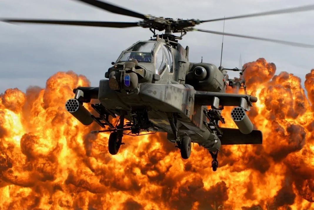An American military helicopter AH-64 Apache in flight off the coast of the Strait of Hormuz.