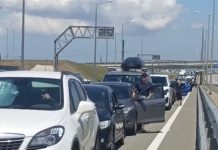 Chaos in Crimea: traffic jams on the bridge and new restrictions for residents The Crimean Bridge, traffic jams at the exit from Crimea, cars queuing.