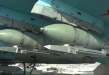 A Russian fighter jet with guided bombs.