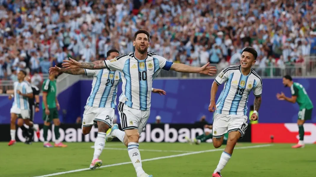 8b7e093a2b6b986433c9f236b3cdd8ef17cda3980e6d11fb5b9a026e56f38a78-1200-675 Lionel Messi celebrates a goal at the 2026 World Cup