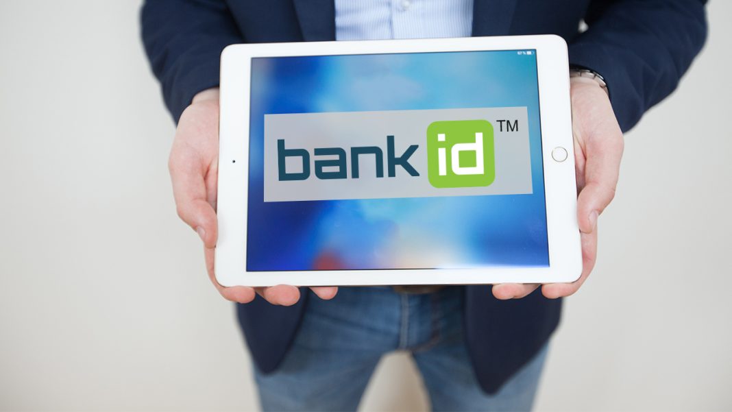 The National Bank of Ukraine’s BankID logo against the background of a computer screen. The National Bank of Ukraine’s BankID logo against the background of a computer screen.