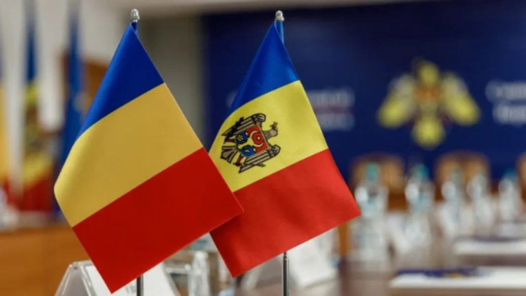 A sitting of the Romanian Chamber of Deputies, discussing a bill on unification with Moldova. The flags of Moldova and Romania