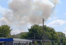 A fire at a factory in Dnipro following a Russian ballistic strike.