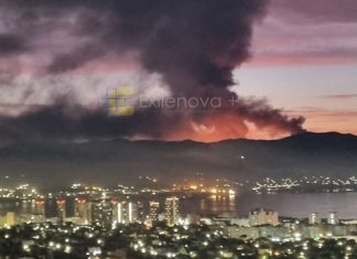 Fire at the Grushova oil depot in Novorossiysk after a drone attack, rescuers at the scene.