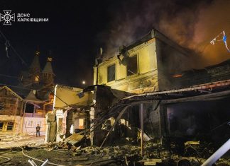Aftermath of Russian attack on Kharkiv: destroyed building and fire after drone strike