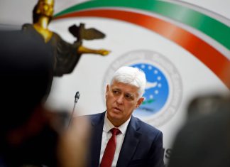 Bulgarian Defence Minister Dimitar Stoyanov announces the suspension of military aid to Ukraine during a press conference.