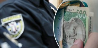 Police and rescuers will receive a sharp increase in salaries: Rada passes law Police officers on patrol in the city with a government building in the background.