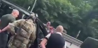 Law enforcement officers from the State Bureau of Investigation are conducting a search of the car belonging to Borisov, the former head of the military registration and enlistment office, near Kyiv.