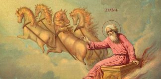 An icon of Saint Elijah the Prophet in a fiery chariot drawn by four horses
