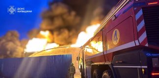Rosenbauer airfield firefighting vehicle and SES rescuer extinguish large-scale fire in Boryspil district after UAV attack