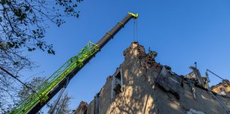 The site of an air strike in the Kholodnohirskyi district of Kharkiv, showing a damaged house.