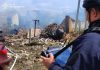 Артобстріл на Херсонщині: травми та пожежі в житловому секторі Артобстріл на Херсонщині: пожежа в житловому секторі та рятувальники.