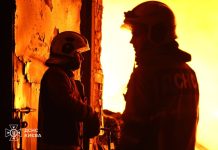 Emergency services are putting out a fire in Kyiv following a shelling attack.