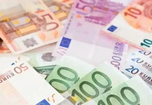 Billions of euros for Ukraine: a detailed analysis of financial aid Close-up of scattered euro banknotes of various denominations