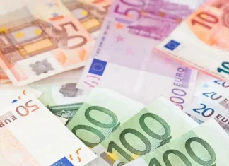 Billions of euros for Ukraine: a detailed analysis of financial aid Close-up of scattered euro banknotes of various denominations