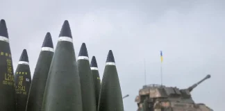 Switzerland has joined NATO’s ammunition procurement mechanism Artillery ammunition next to a self-propelled artillery piece