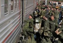 The autumn mobilisation in Russia in 2026: illusions and reality Russian soldiers board a train during the mobilisation in Russia.